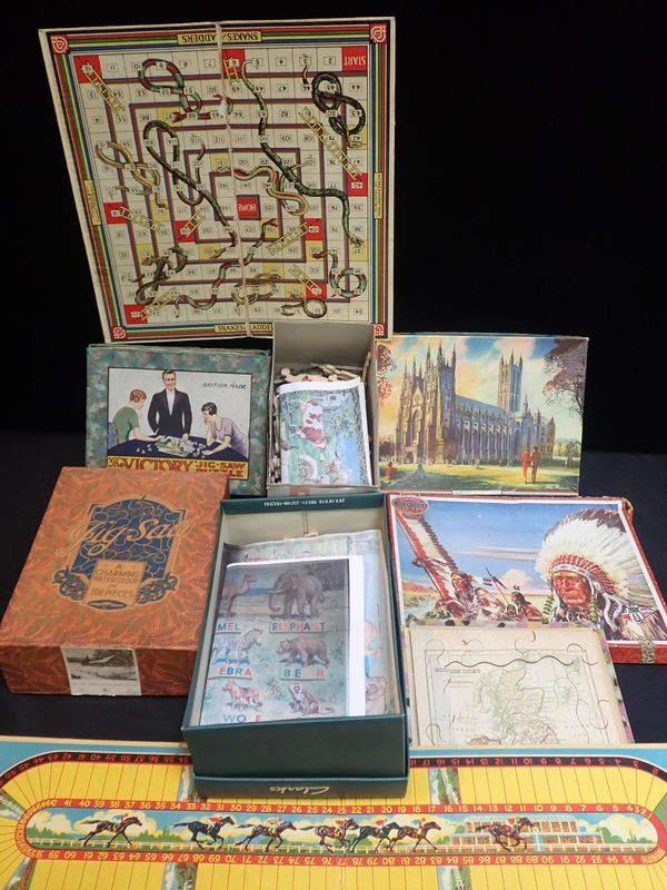 A COLLECTION OF WOODEN JIG-SAW PUZZLES