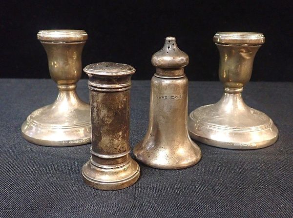 A PAIR OF SILVER SQUAT CANDLESTICKS