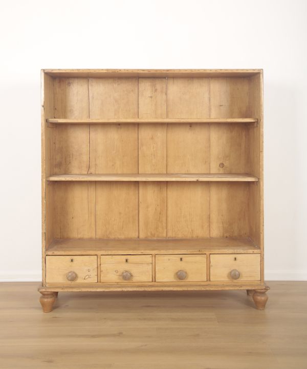 AN OPEN PITCH PINE BOOKCASE