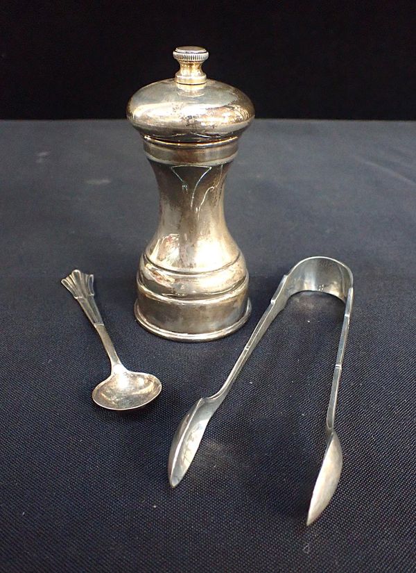 A SILVER PEPPER MILL