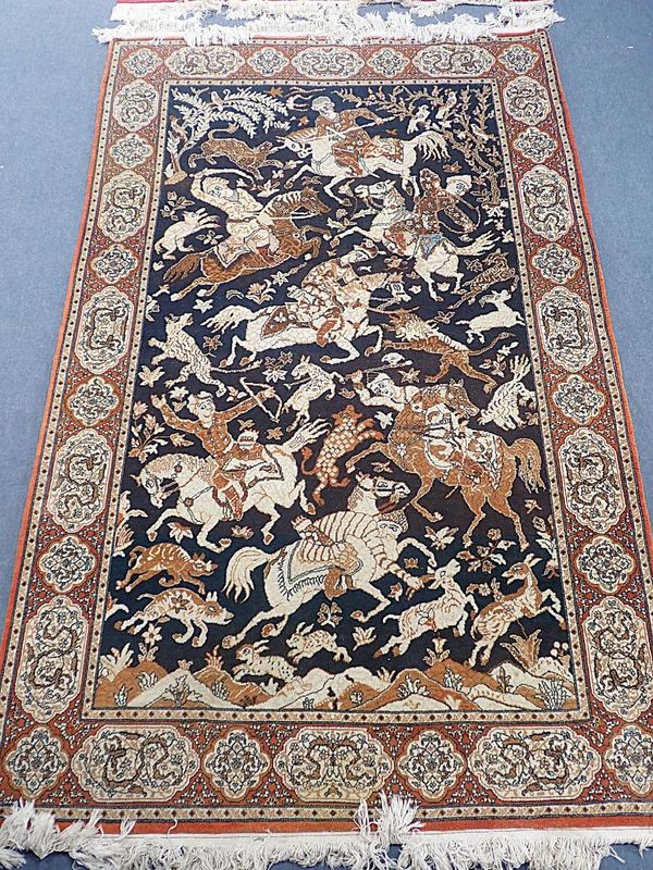 AN INDIAN RUG OF PERSIAN 'HUNTING' DESIGN