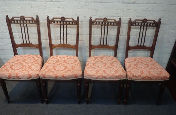 A SET OF FOUR LATE VICTORIAN AESTHETIC MOVEMENT ROSEWOOD SIDE CHAIRS