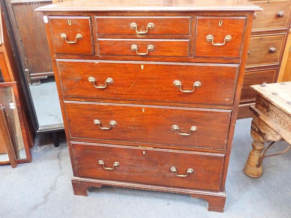 A MAHOGANY CHEST OF DRAWERS, WITH BRASS HEAL & SON LABEL