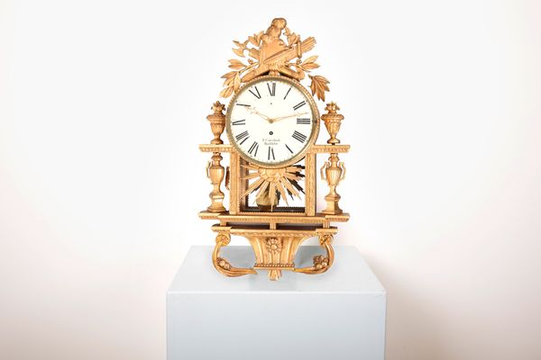 A SWEDISH NEOCLASSICAL GILTWOOD WALL CLOCK BY JON CEDERLUND, STOCKHOLM
