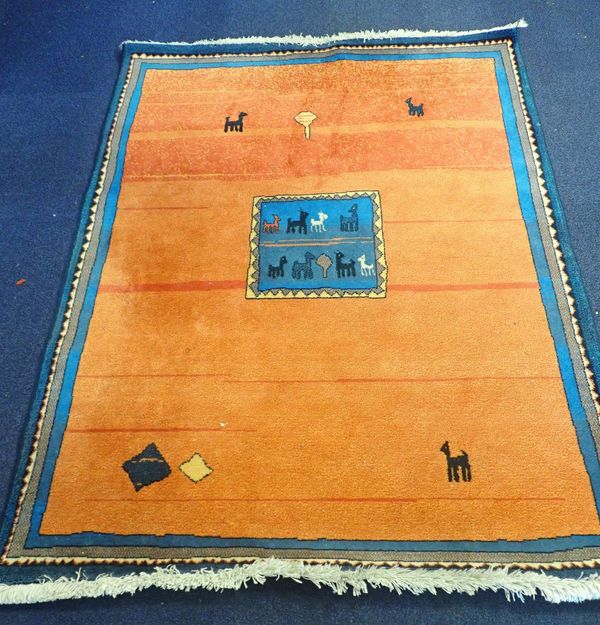 A SMALL PERUVIAN STYLE RUG