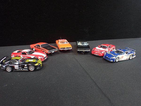 SEVEN UNBOXED SCALEXTRIC 'DODGE' CARS