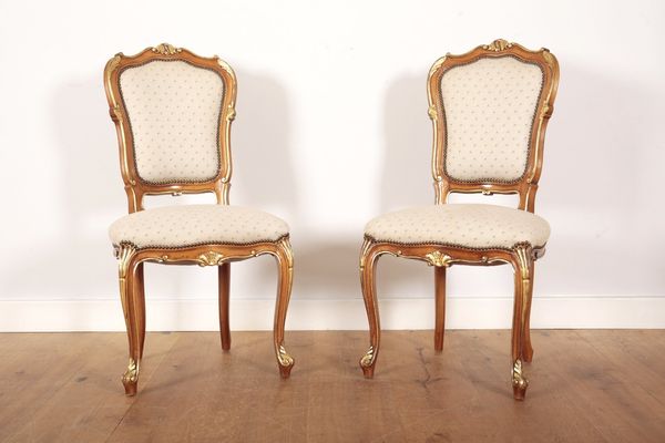 A PAIR OF FRENCH LOUIS XV STYLE BERGERE CHAIRS