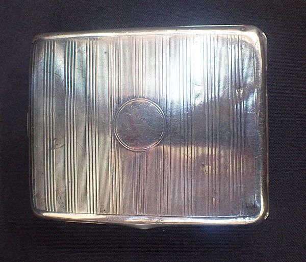 A GEORGE V SILVER CIGARETTE CASE