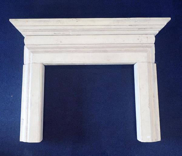 A RECONSTITUTED STONE FIRE SURROUND