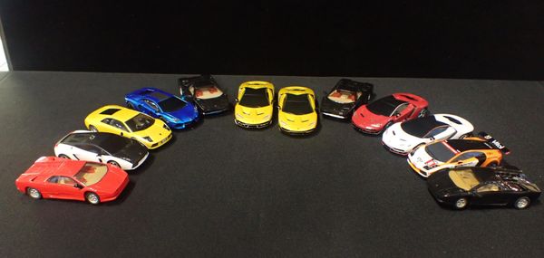 TWELVE UNBOXED SCALEXTRIC 'LAMBORGHINI' CARS