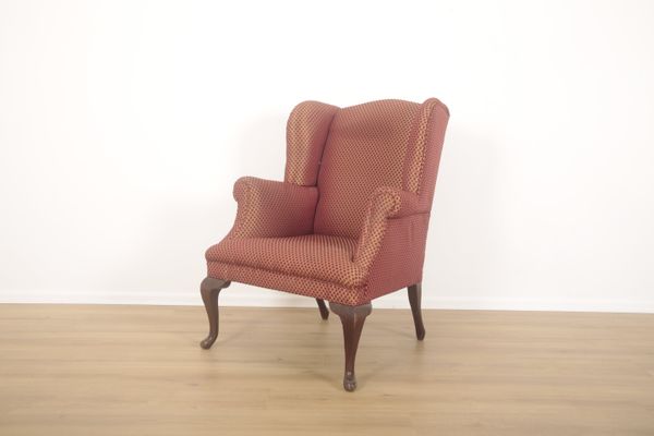 A  WING ARMCHAIR IN GEORGIAN STYLE