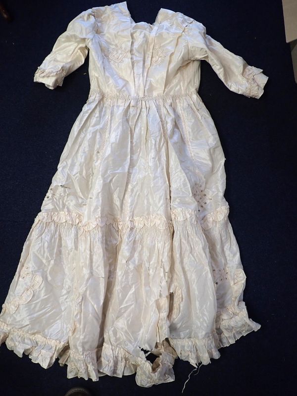 A MID VICTORIAN CREAM SILK DRESS