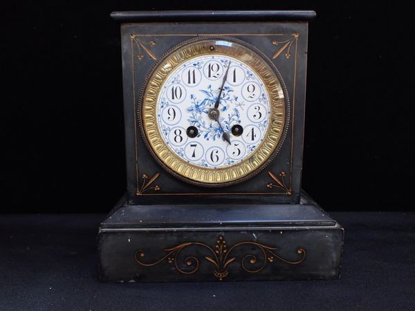 A VICTORIAN SLATE-CASED MANTEL CLOCK