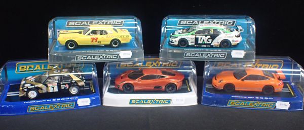 FIVE BOXED SCALEXTRIC CARS