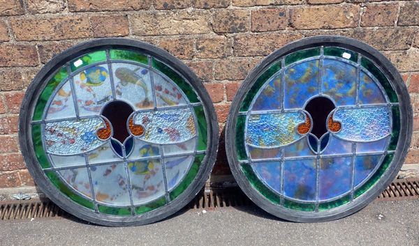 A PAIR OF 1920s LEADED GLASS WINDOW ROUNDELS
