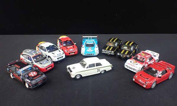 TEN UNBOXED SCALEXTRIC 'FORD' CARS