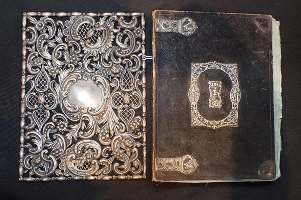 A SILVER BLOTTER FRONT, WILLIAM COMYNS, LONDON 1906