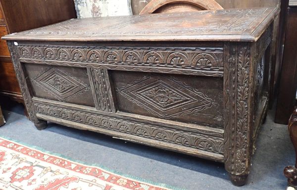 A 17th CENTURY OAK PANELLED COFFER