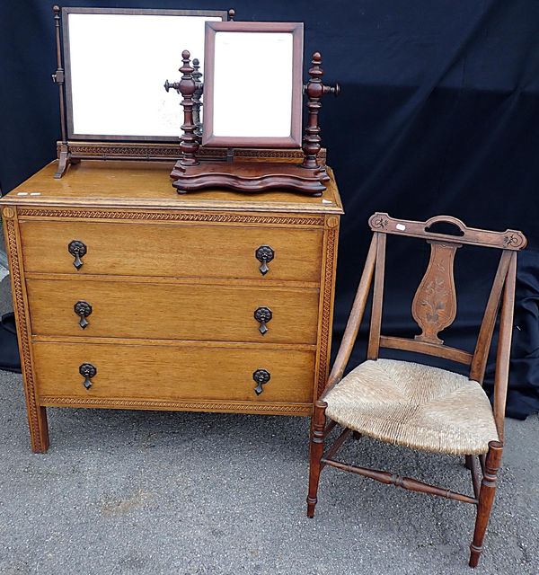 A 1930s OAK CHEST OF DRAWERS