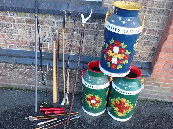 THREE 'UNITED DAIRIES' MILK CHURNS, PAINTED IN BARGE STYLE