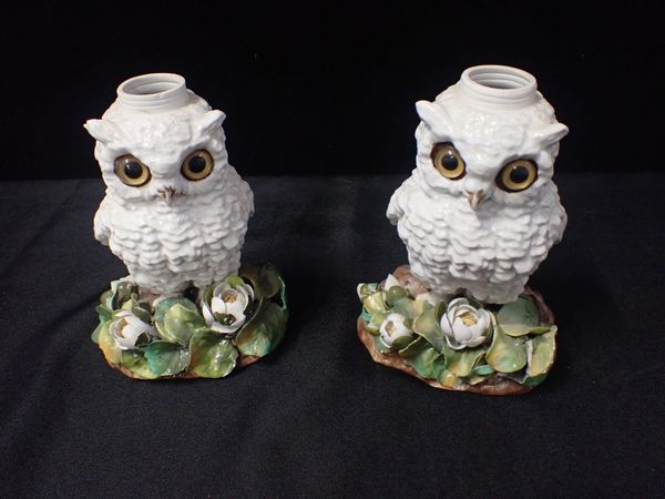 A PAIR OF VICTORIAN PORCELAIN OWL TABLE OIL LAMP BASES