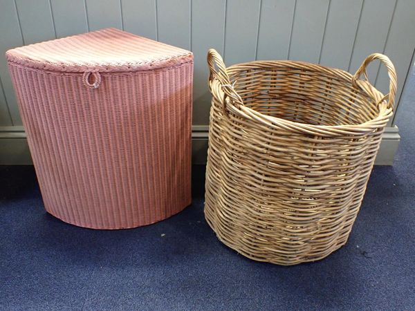 A WICKER LOG BASKET, WITH HANDLES