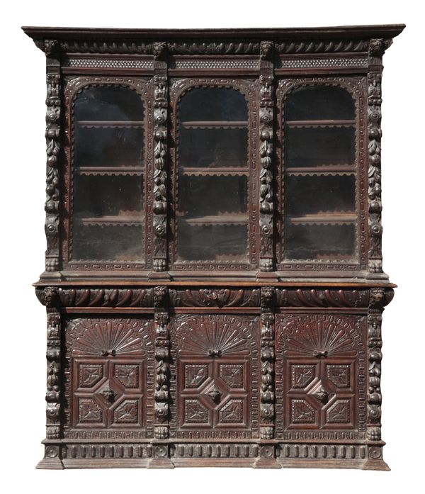 AN OAK JACOBEAN REVIVAL OAK BOOKCASE