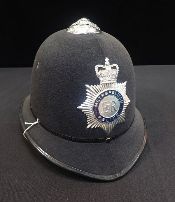 A METROPOLITAN POLICE HELMET