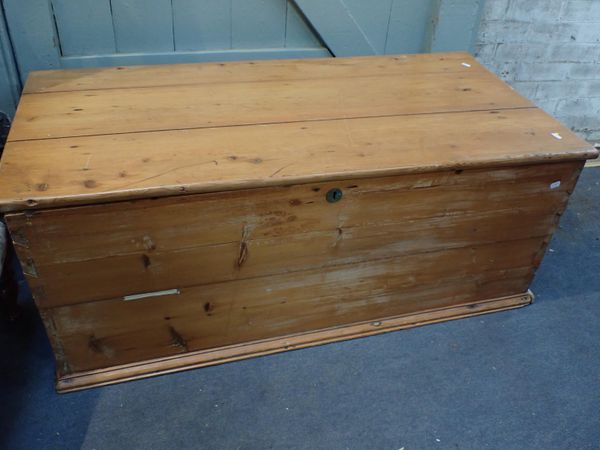 A LARGE VICTORIAN PINE TRUNK