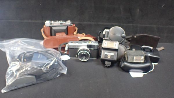 A COLLECTION OF CAMERAS AND ACCESSORIES