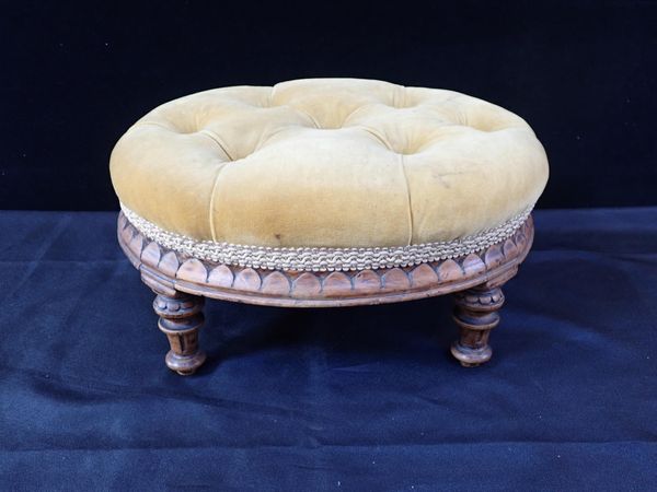 A 19TH CENTURY WALNUT OVAL FOOTSTOOL