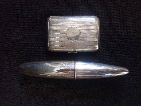 A SILVER CIGARETTE CASE