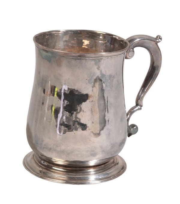 A GEORGE III SILVER TANKARD