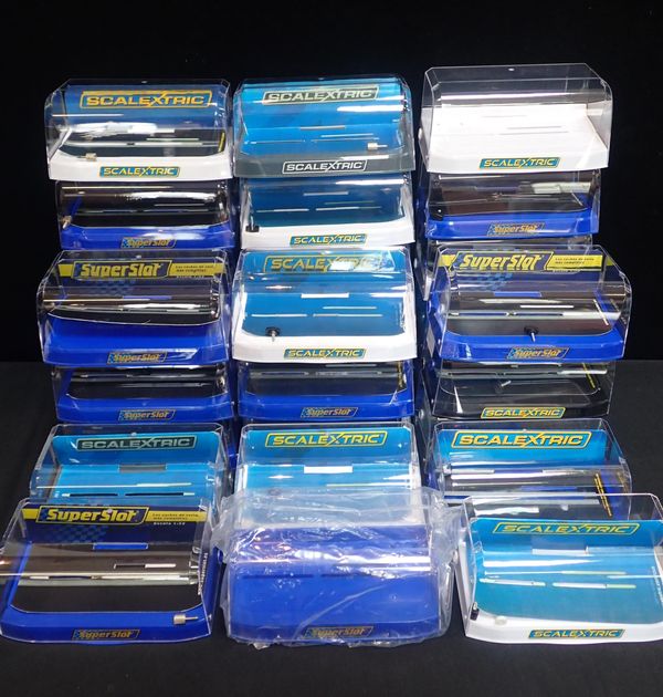 A QUANTITY OF EMPTY SCALEXTRIC CAR DISPLAY CASES