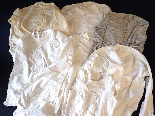 A QUANTITY OF VINTAGFE COLLARLESS SHIRTS