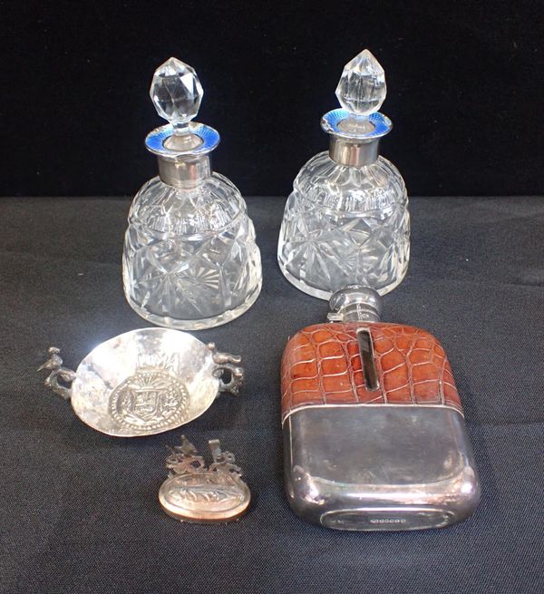 A PAIR OF BOTTLES WITH SILVER COLLARS