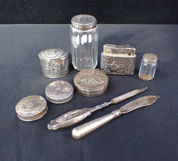 A SILVER TOPPED JAR