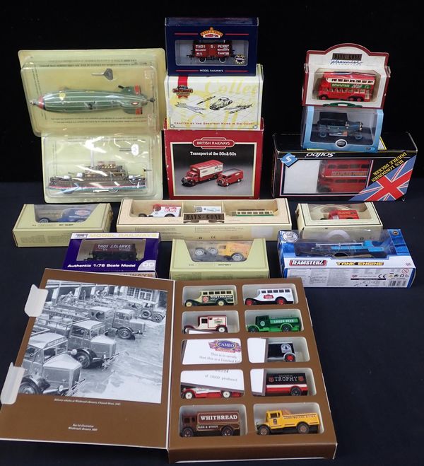 A COLLECTION OF BOXED DIECAST AND TIN PLATE MODELS