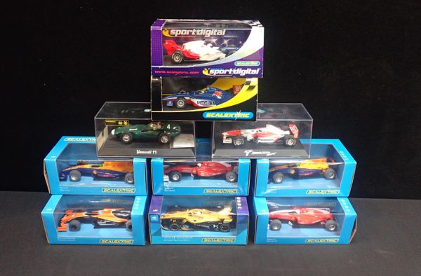 TEN BOXED SCALEXTRIC CARS