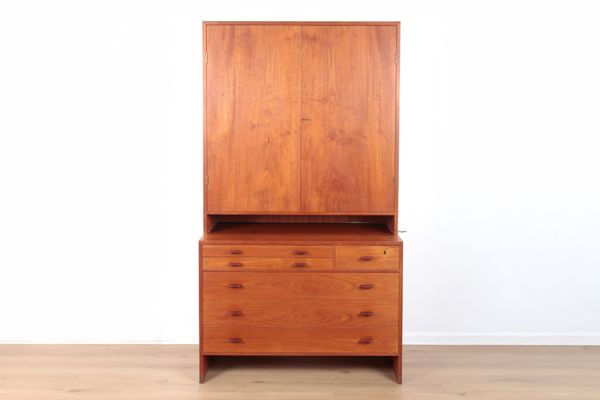 A DANISH TALL TEAK CABINET