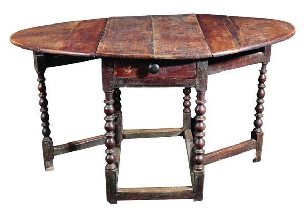 A WILLIAM AND MARY OAK DROP LEAF TABLE