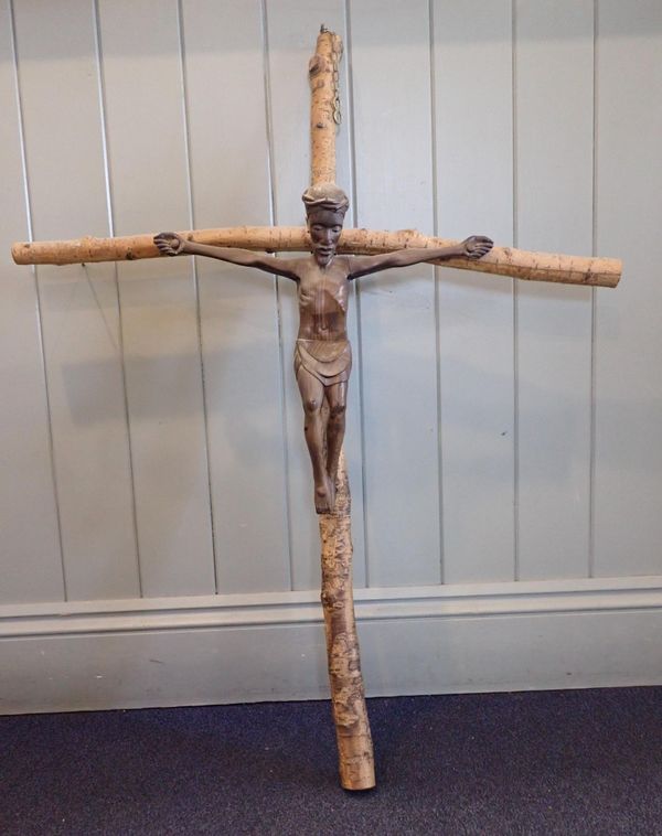 AN AFRICAN SCULPTURAL CRUCIFIX
