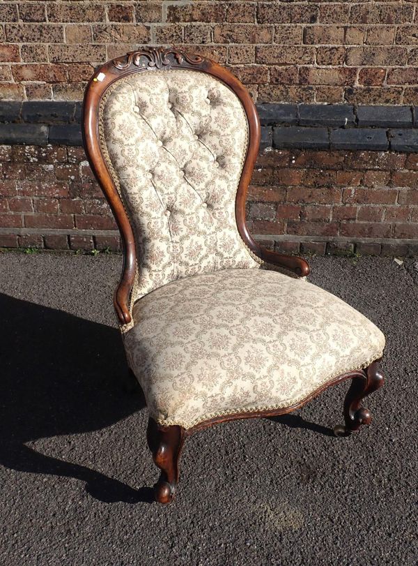 A VICTORIAN WALNUT SPOONBACK NURSING CHAIR