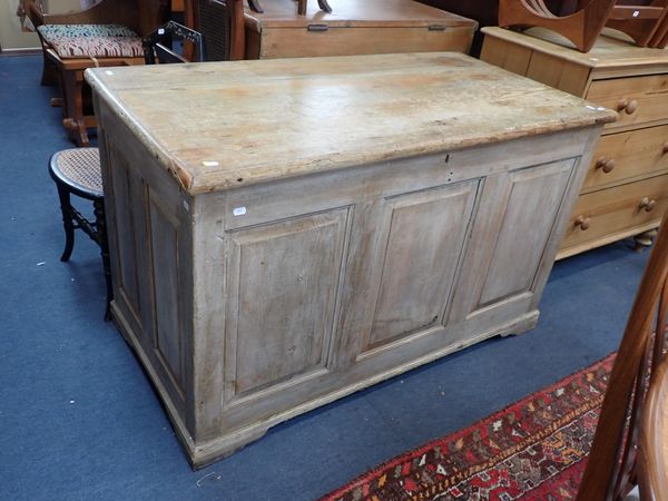 A LARGE EARLY 18TH CENTURY PANELLED STRIPPED PINE COFFER