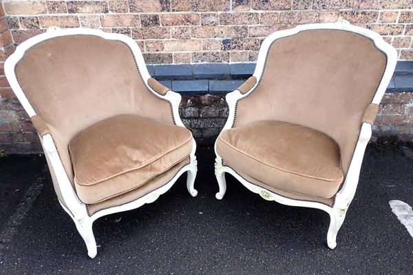 A PAIR OF FRENCH UPHOLSTERED ARMCHAIRS