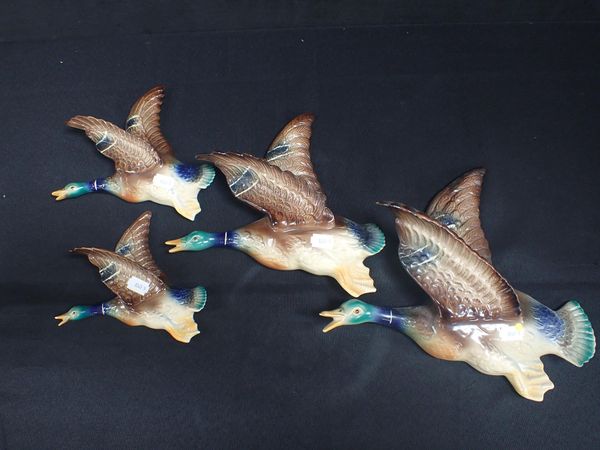 A SET OF FLYING DUCKS