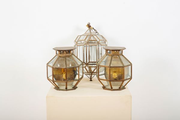 A FACETED GLASS AND GILT METAL HALL LANTERN IN THE MOROCCAN STYLE