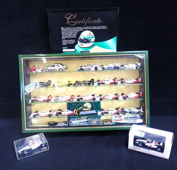 A COLLECTION OF AYRTON SENNA MODEL RACING CARS