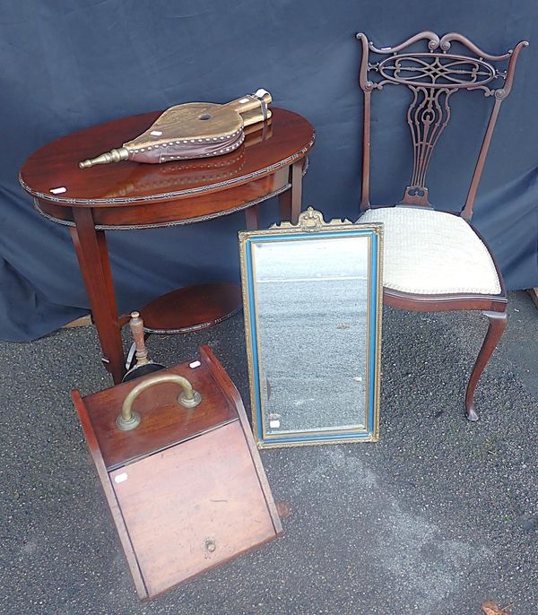 A 1920s MAHOGANY OVAL WINDOW TABLE