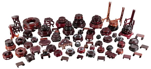 A LARGE COLLECTION OF CHINESE WOOD STANDS